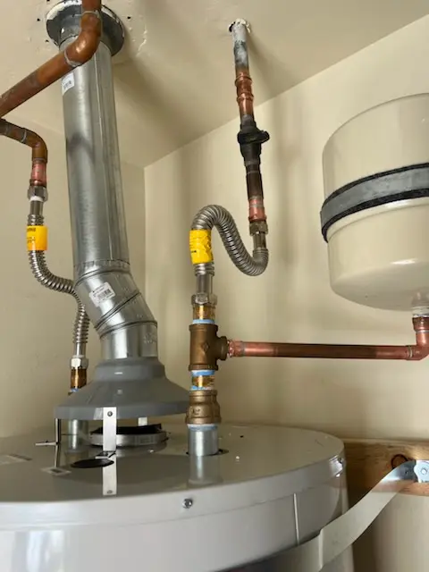 Water heater installation and plumbing repair in Dill